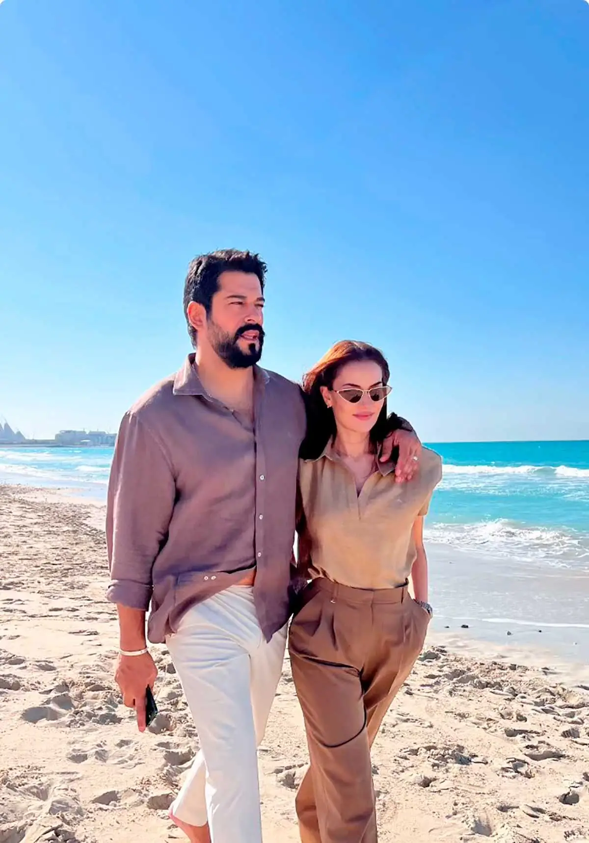 Burak Özçivit and Fahriye Evcen at a public event