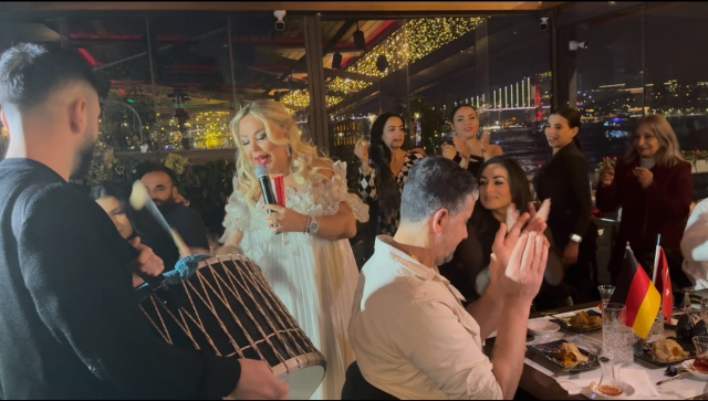 Faik Öztürk serving turkey at Yakamoz Restaurant