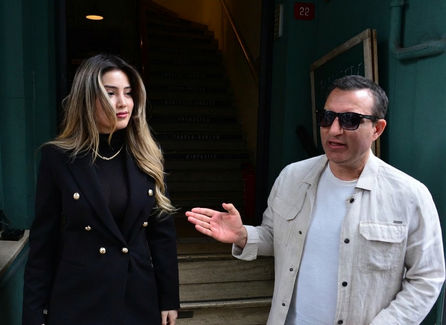 Rafet El Roman showing his engagement ring to reporters