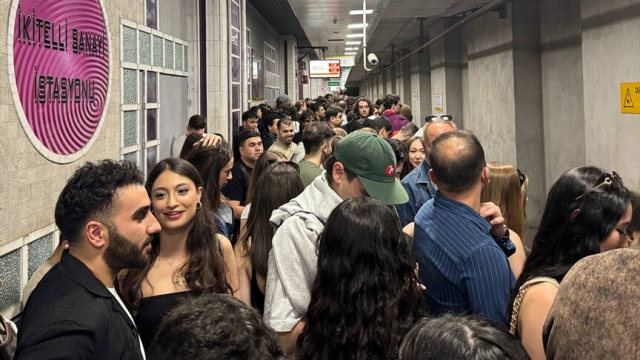 Fans experiencing ticket and QR code issues at the entrance of the stadium