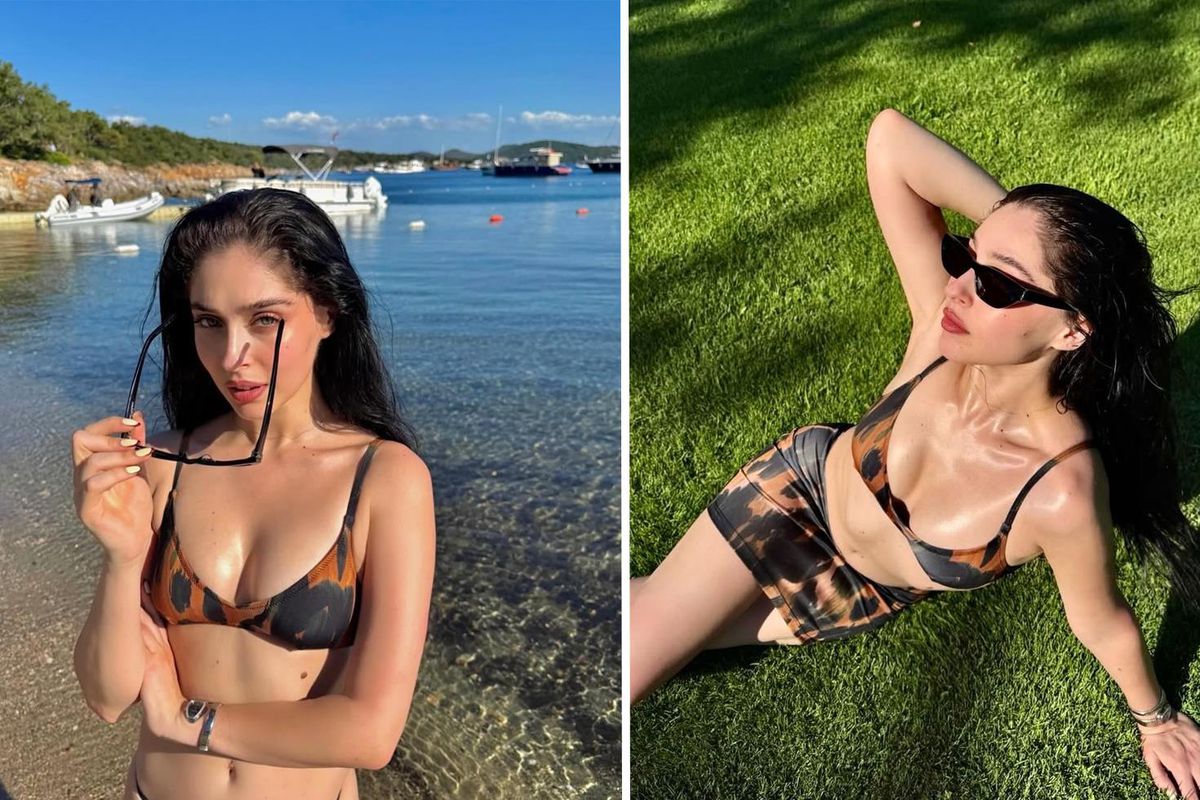 Cemre Baysel posing in a leopard print bikini in the Aegean bays